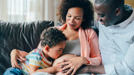 Mixed race family waiting for the new baby