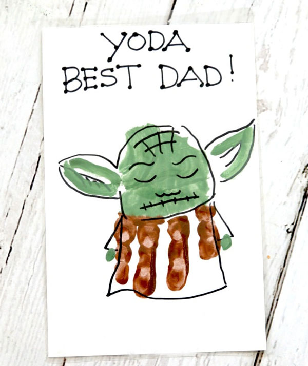 Homemade Father's Day card made from white paper witrh a handdrawn image of Star Wars' Yoda on it, the words read Yoda Best Dad!