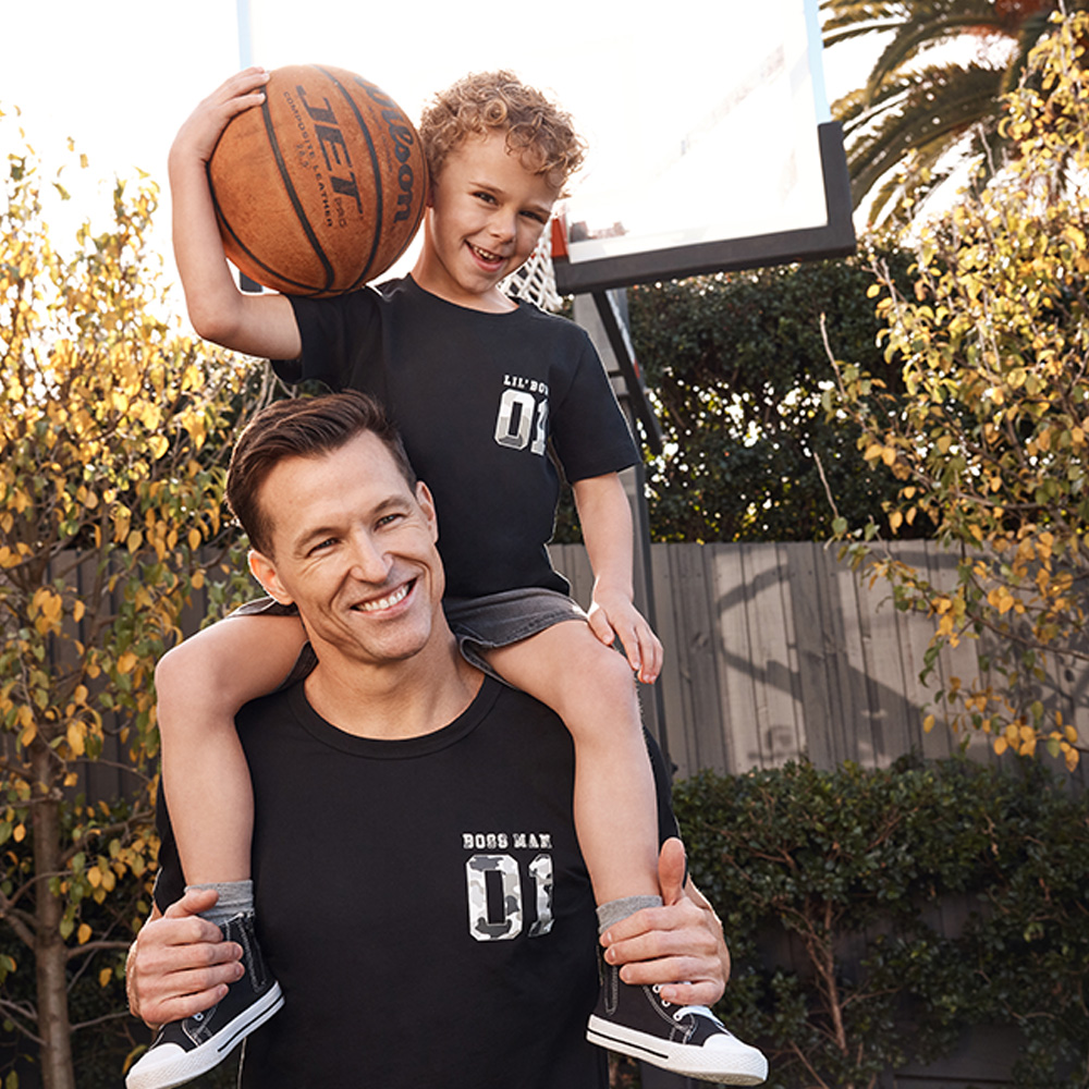 Father and son wearing matching sports clothes from best and less