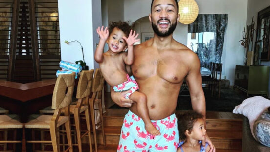 John legend in matching swim wear with children Miles and Luna