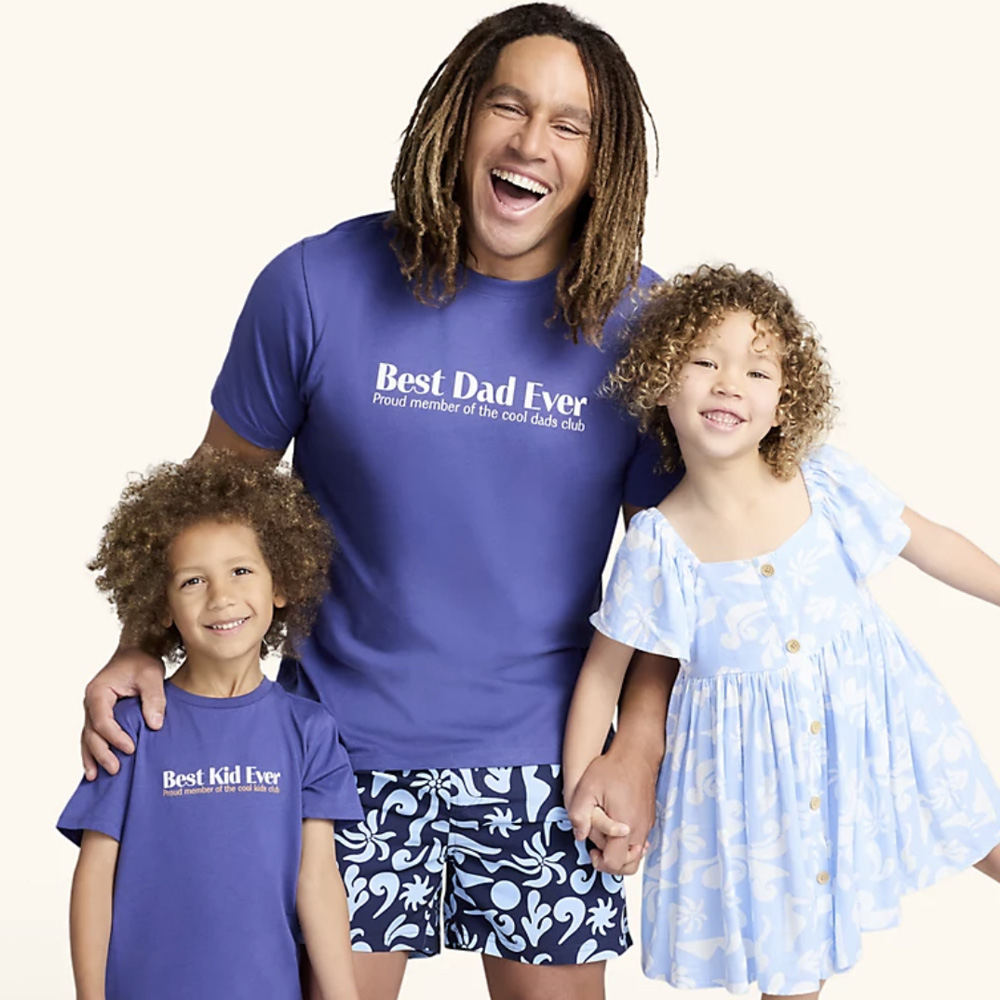 big w matching clothes - father and children smiling in matching fashion