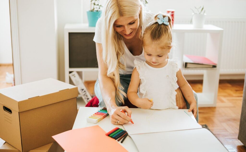 Organised mum colouring with daughter