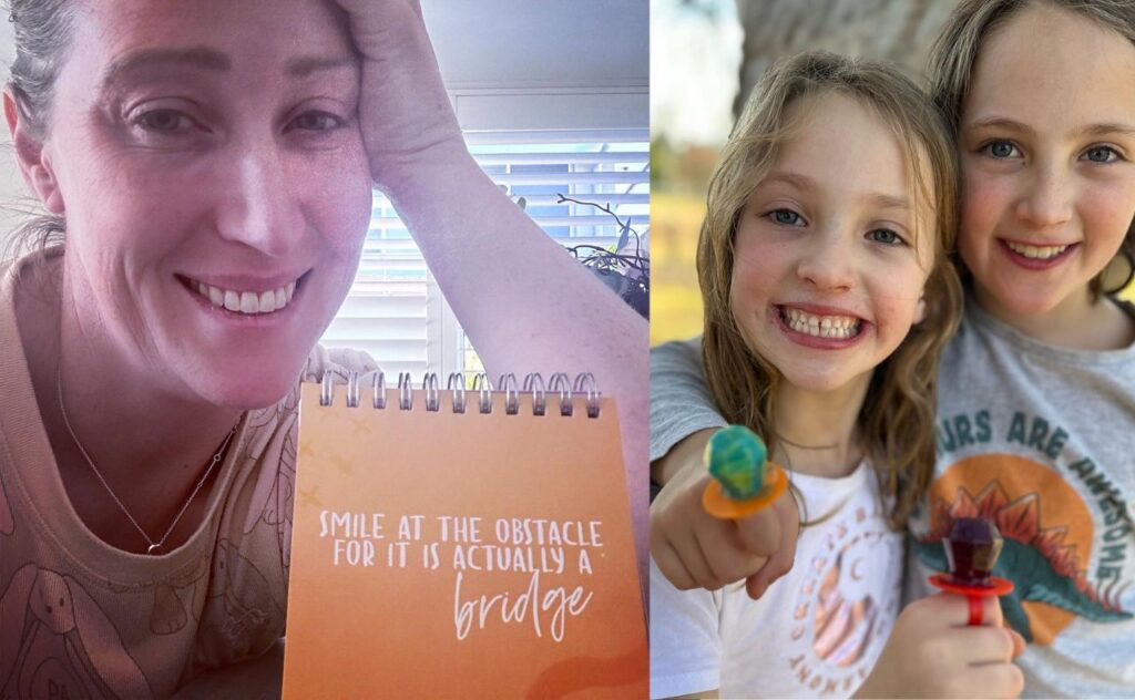 Jana smiles at the camera  and her two older daughters smile with their ring lollies