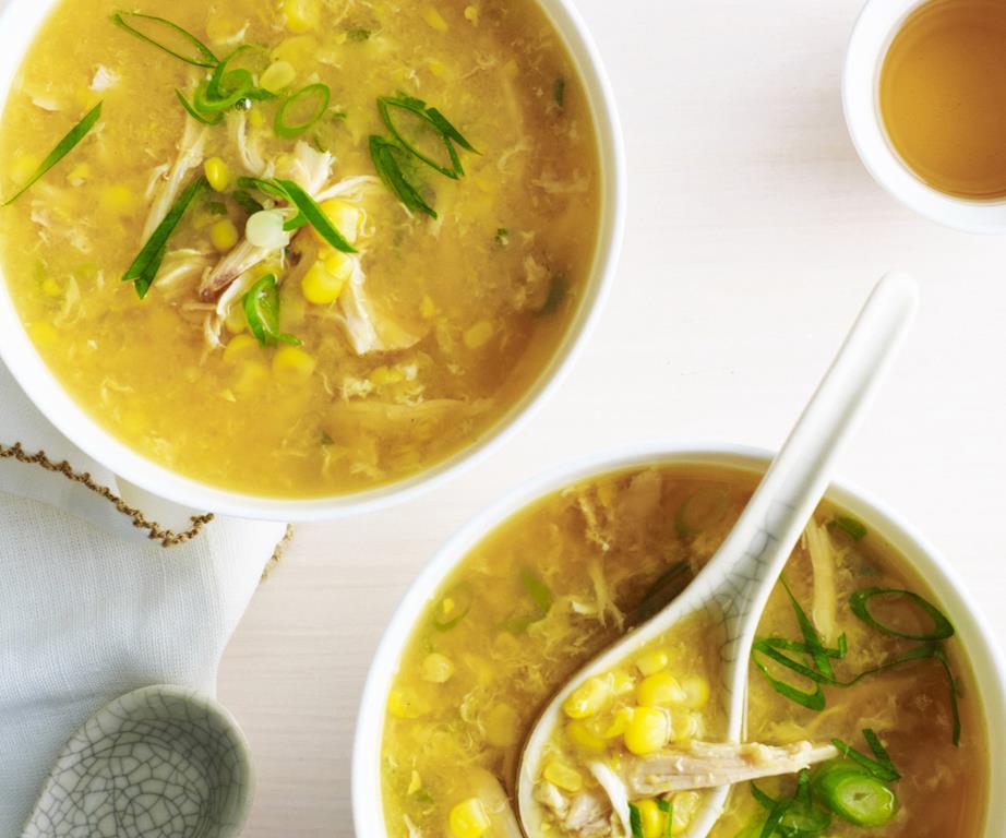 Bowls of chicken and sweetcorn soup for a hot school lunch