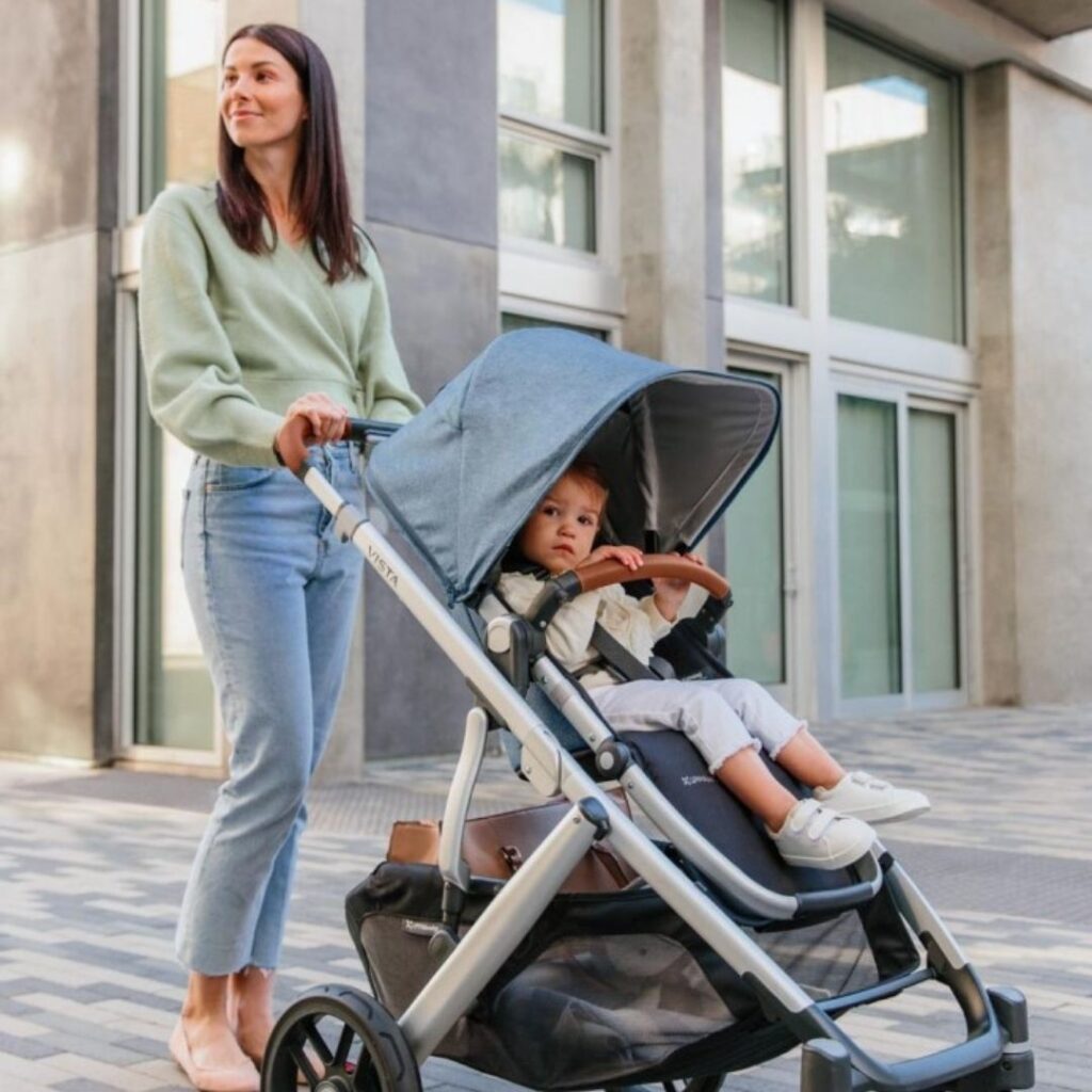 Uppababy Vista v2 mother pushing toddler in a pram