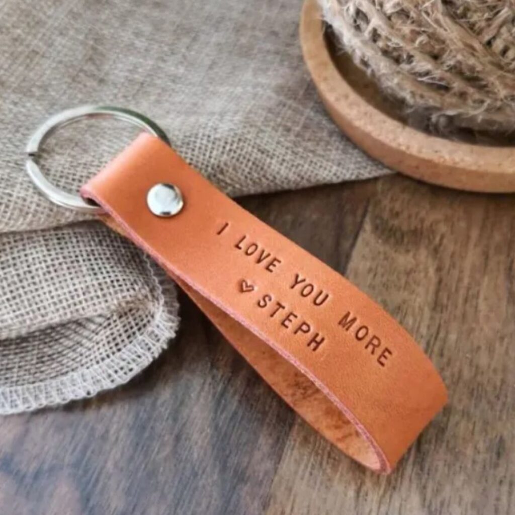 PERSONALISED I LOVE YOU MORE LEATHER KEYRING