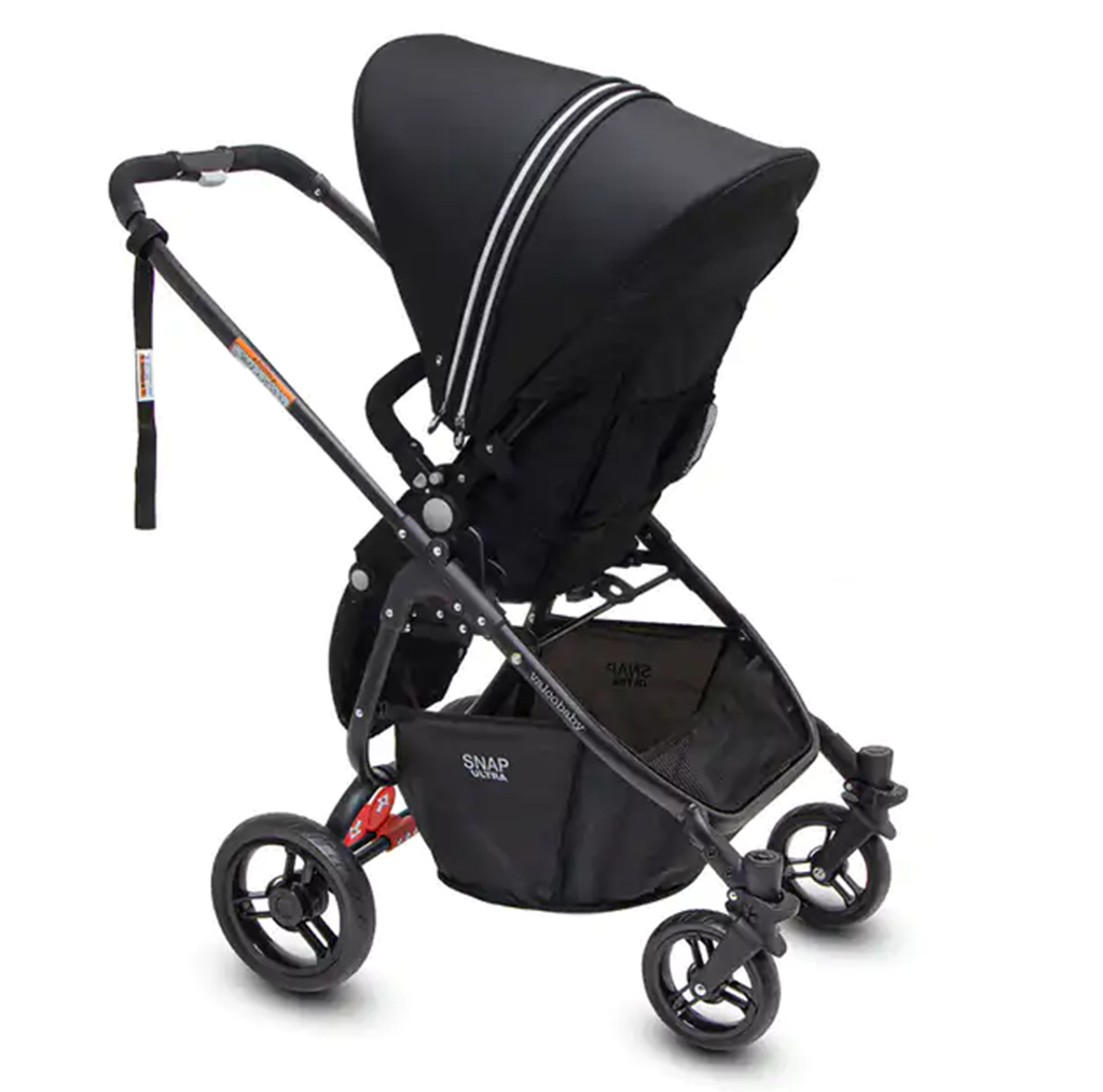 Valco baby Snap Ultra P Stroller in black  with a white stripe across the hood