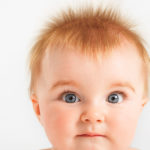 Irish baby names - small red haired infant with spiky hair