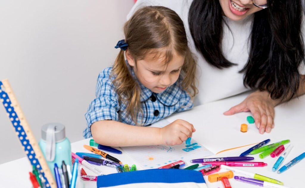 child doing art and craft