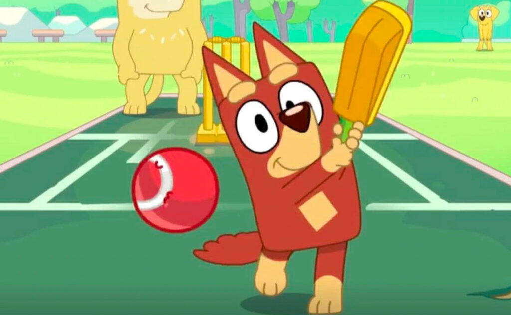 A still image of an ABC TV Bluey episode showing the Rusty character hitting a cricket ball with a bat.