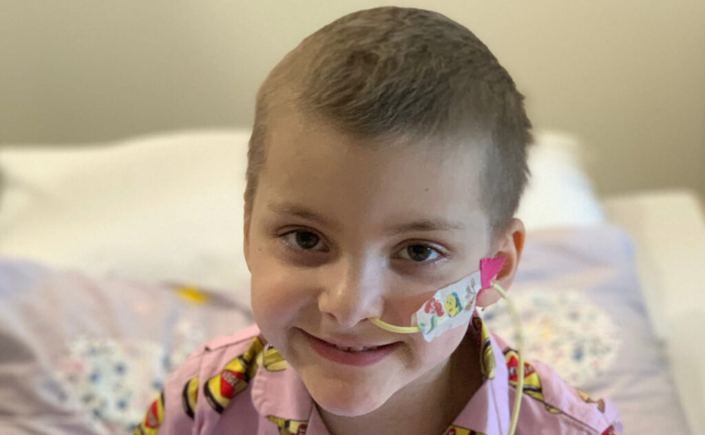 5yo cancer patient Lucy undergoing treatment in hospital.