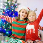 Two girls/ sisters excited for Christmas