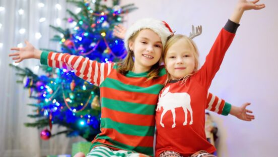 Two girls/ sisters excited for Christmas