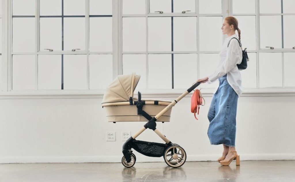 black friday sales - Alf the label bag over pram handle while mum pushes.