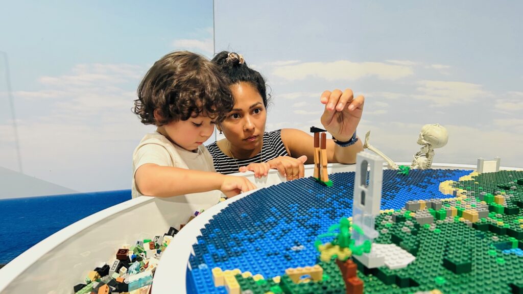 Children enjoy Jurassic World by Brickman® at the Queensland Museum