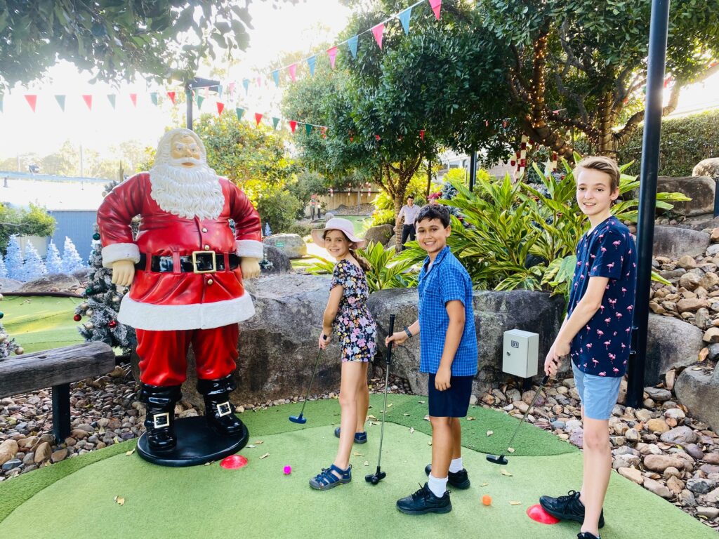 Children enjoying Christmas Mini-Golf at Victoria Park.