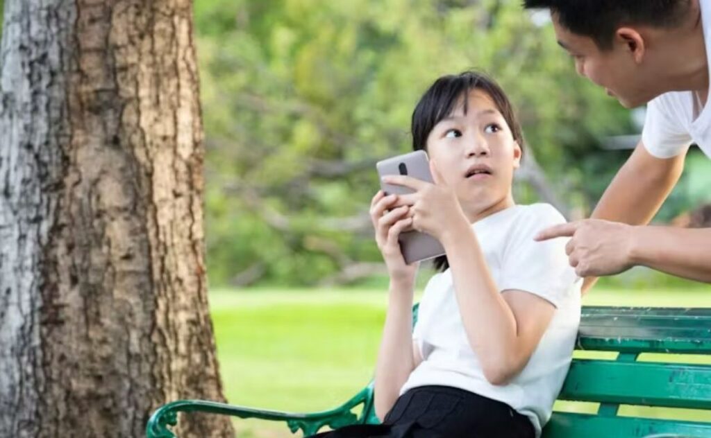 Is it OK for a parent to ask a teen to show them their phone? CGN089/Shutterstock