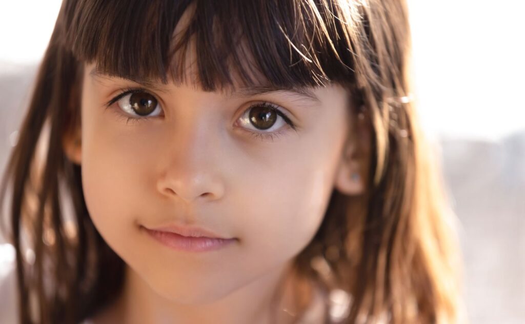 Young girl with big brown eyes