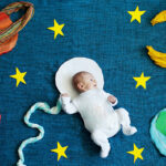 baby photoshoot with astronomy props