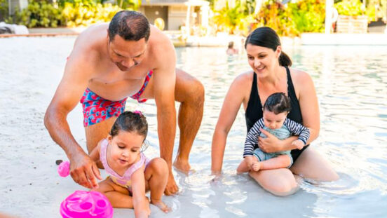 Family of four enjoy Novotel Cairns Oasis Resort pool