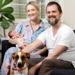 Australian mum Clare Foreman at home with husband Stu, baby Isabel and dog Frances.jpg