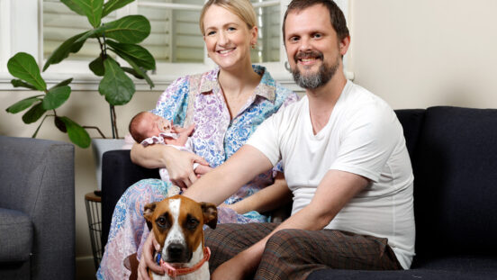 Australian mum Clare Foreman at home with husband Stu, baby Isabel and dog Frances.jpg