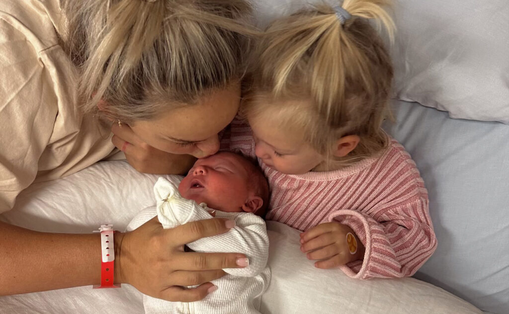 Mackenzie, Sunny and Banks Cotter in hospital after Banks' birth