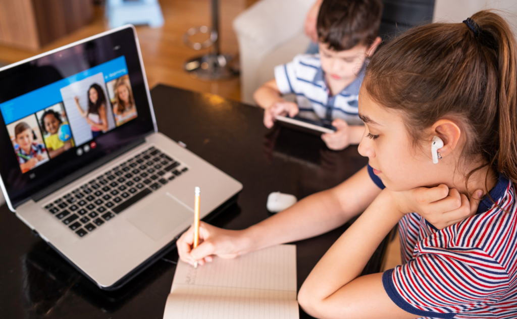 Young teen girl attending online school 