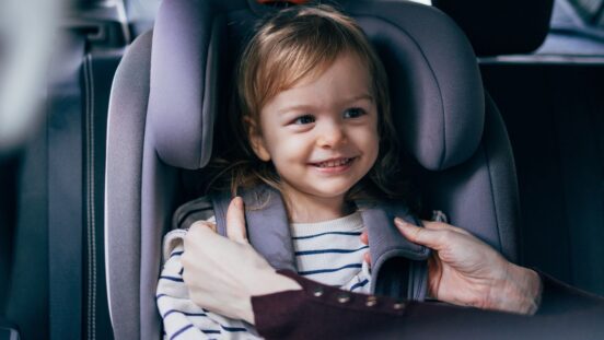 Girl in car seat. Babies and kids riding in taxis and Ubers: The safety rules you need to know