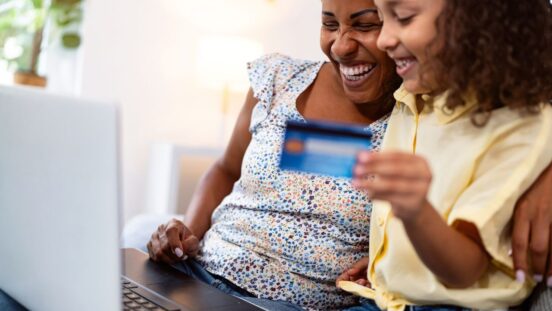 afterpay day sales: Mother and daughter online shopping